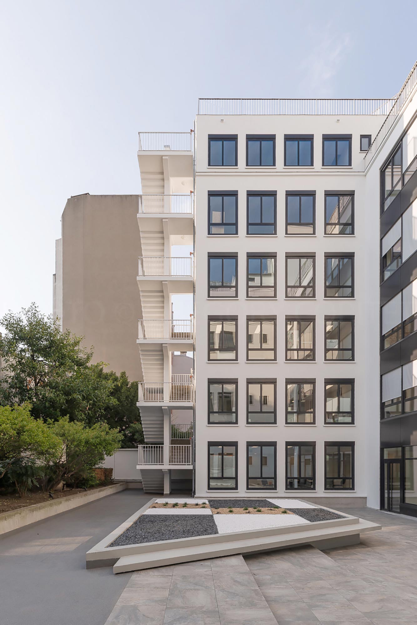 Raf Listowski Atelier d'Architecture création bureaux réhabilitation transformation nouveau siège social Carac Thétis felix potin Neuilly photographie Grégory Copitet